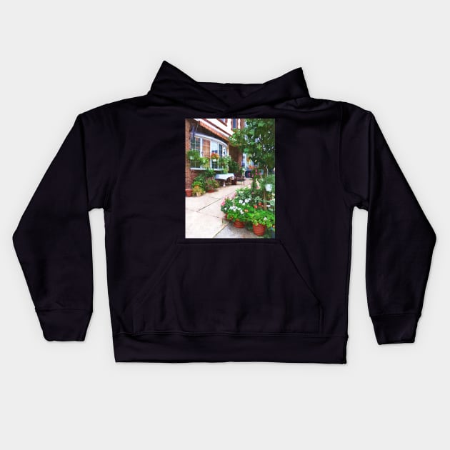 Belvidere NJ - Outdoor Cafe with Flowerpots Kids Hoodie by SusanSavad